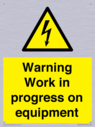 warning-work-in-progress-on-equipmentwith-electrical-hazard-symbol~